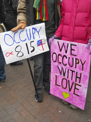 we occupy with love... banner at the action