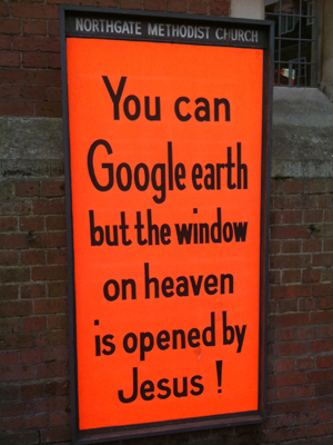 church sign which reads: you can Google earth but the window on heaven is opened by Jesus